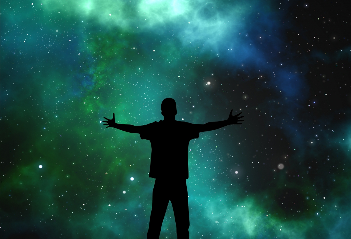 Cosmic people silhouette hug the sky