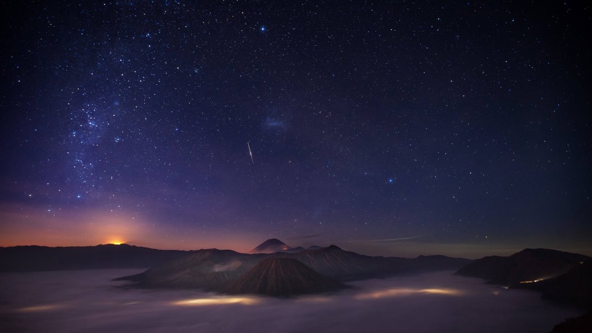 Starry sky meteor volcano at night 4k