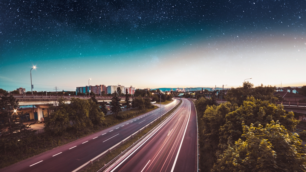 Night highway city sky star