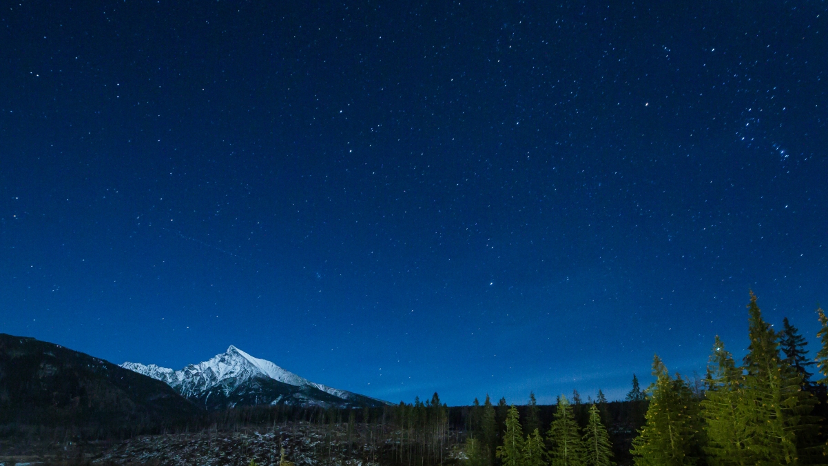 Mountains with night sky starry stars