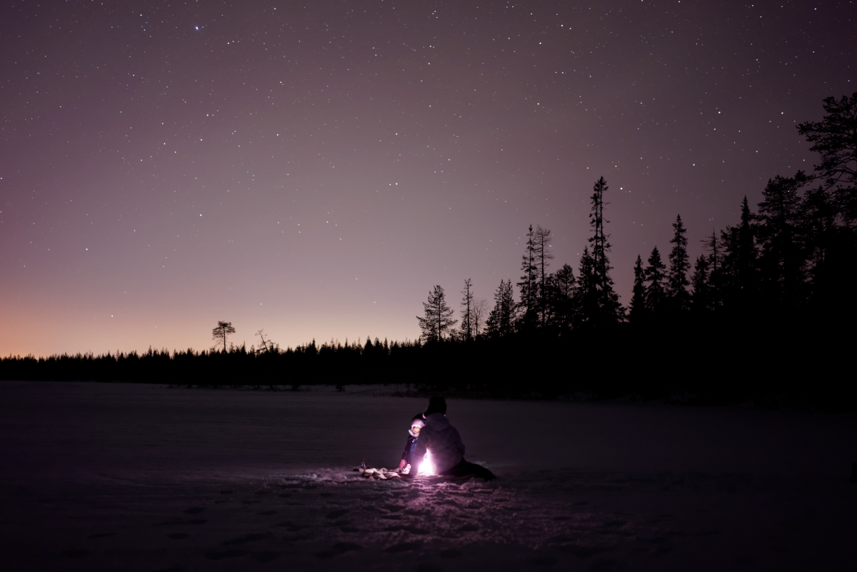 Sunset night mountain starry snow field