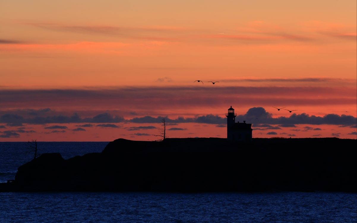 Beautiful night seaside lighthouse 4K wind