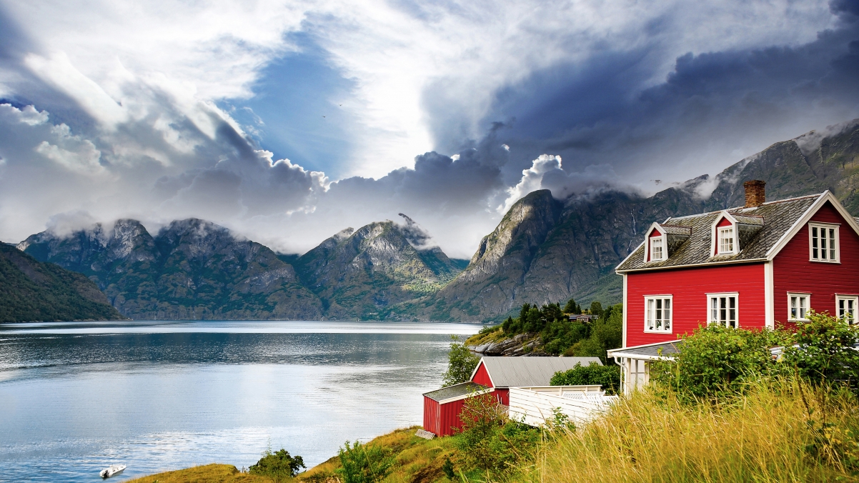 Beautiful norwegian mountain lake houses scenery