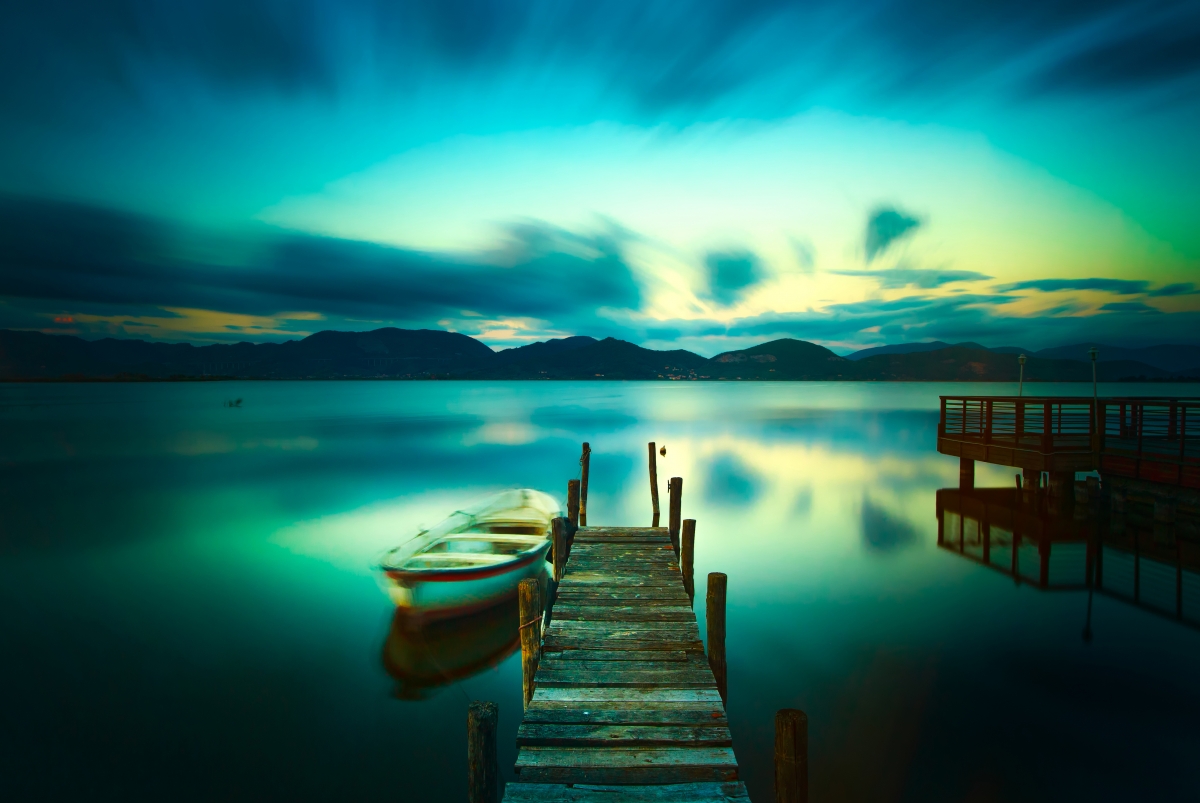 4k scenery of pier and boat on the lake