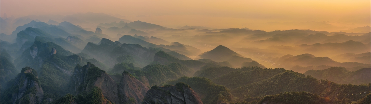 Sunrise scenery of rolling mountains Hunan