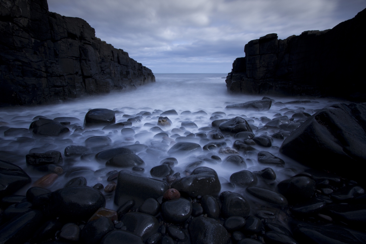 Pebbles rocks ocean beach sea
