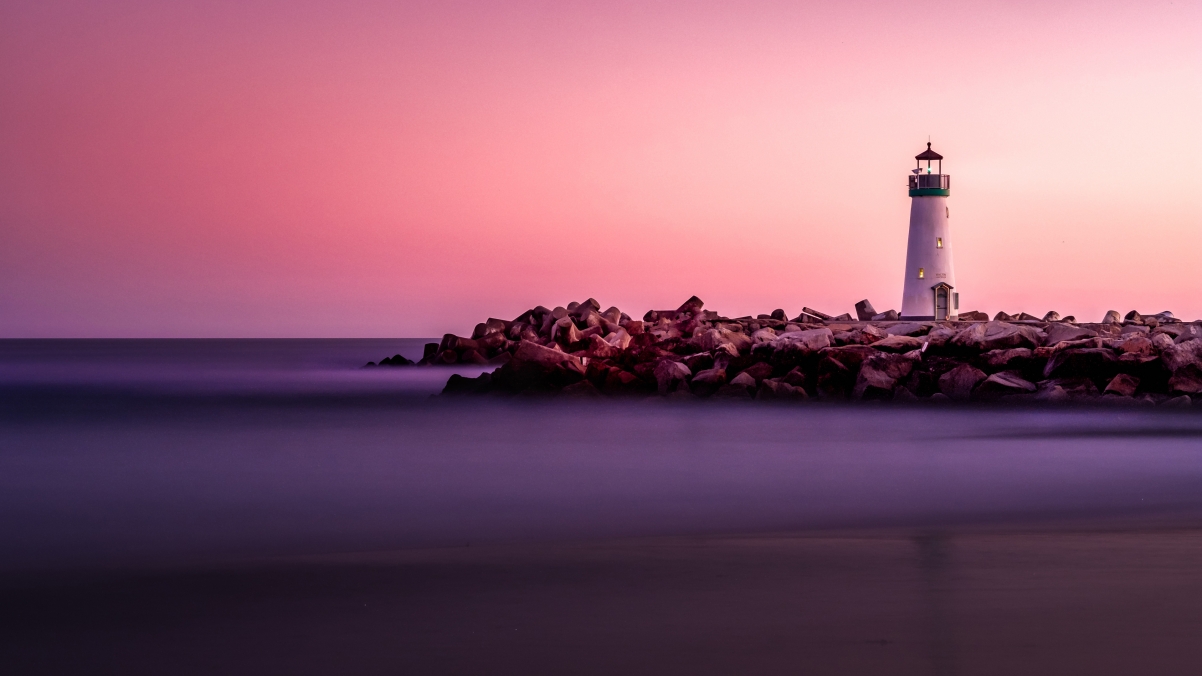 Lighthouse sunset 4k landscape wallpaper