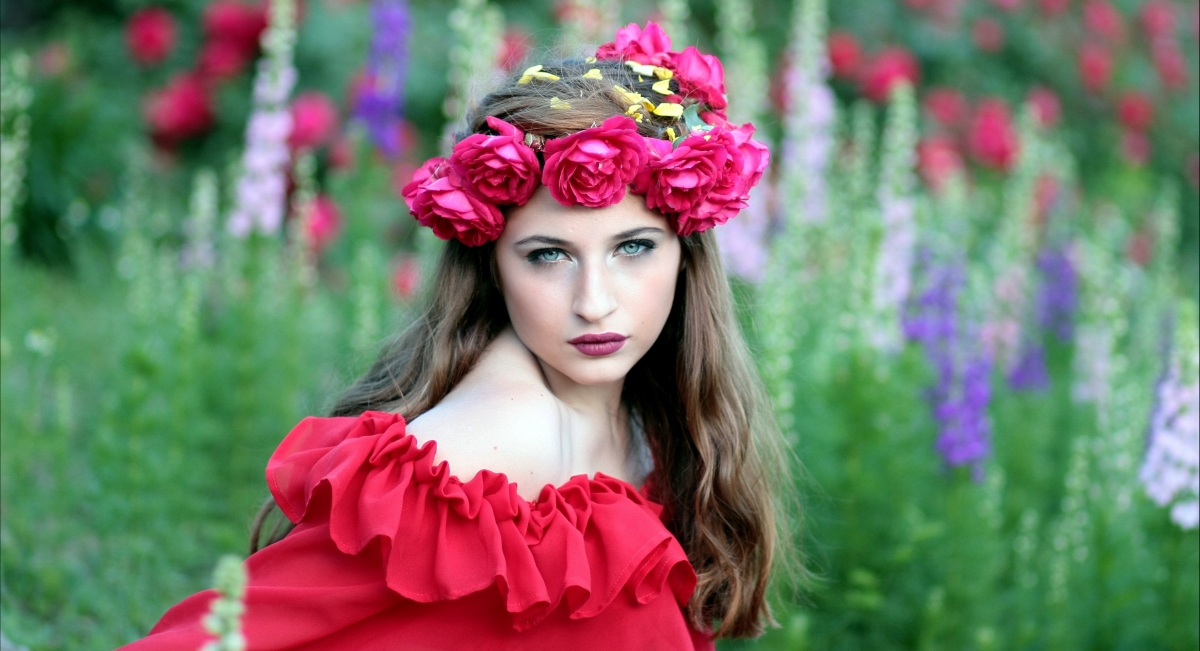 Girl in flower wreath natural photo