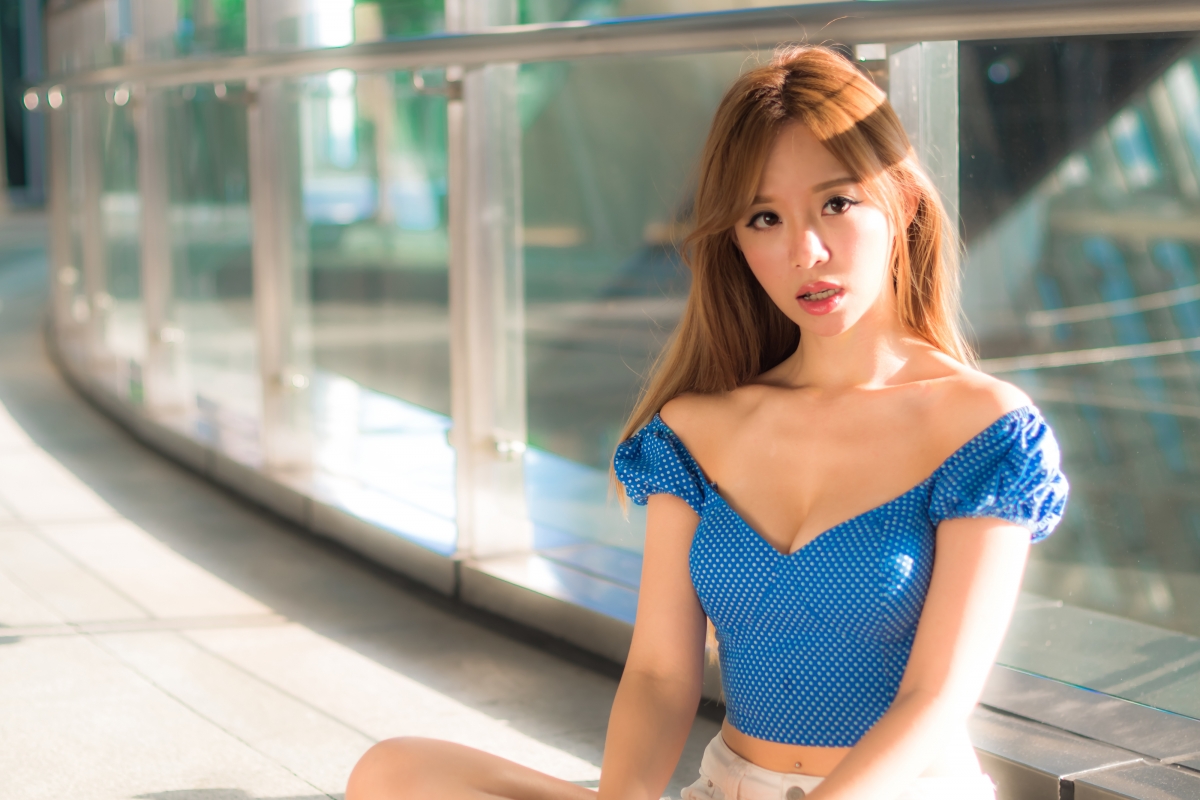 Girl hair face eyes cross-legged