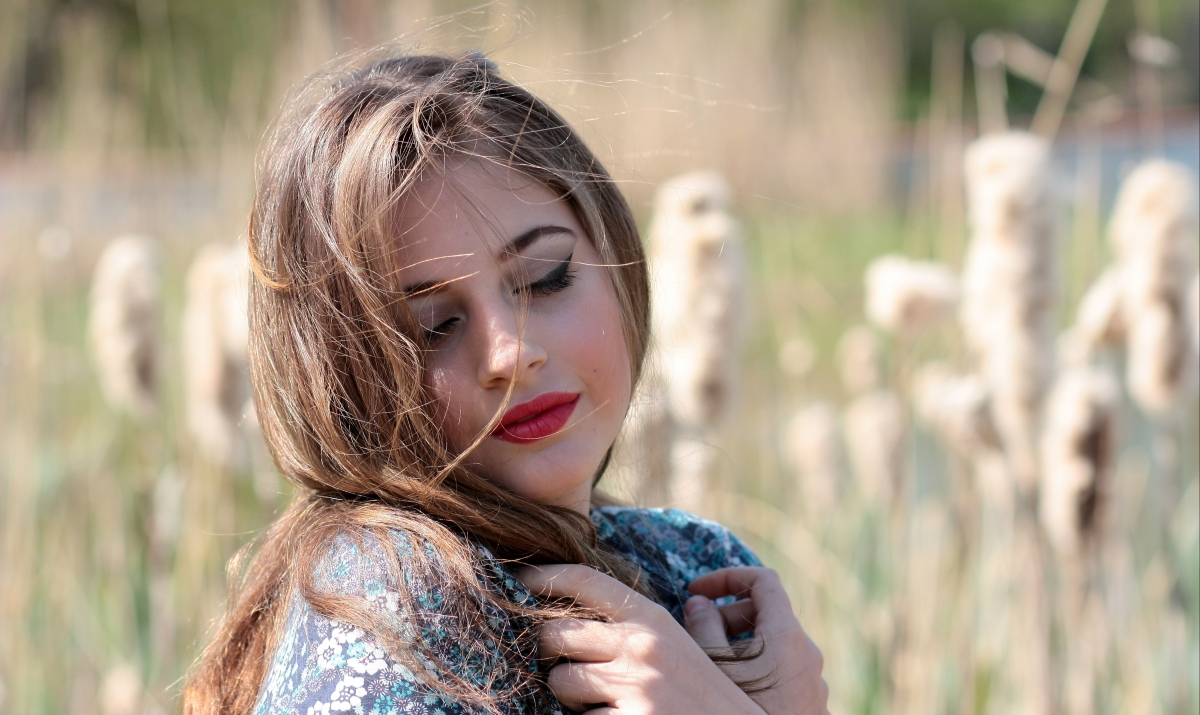 Girl blonde seductively closed