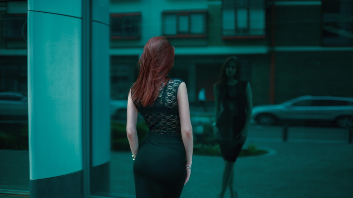 Girl behind the dress from the back