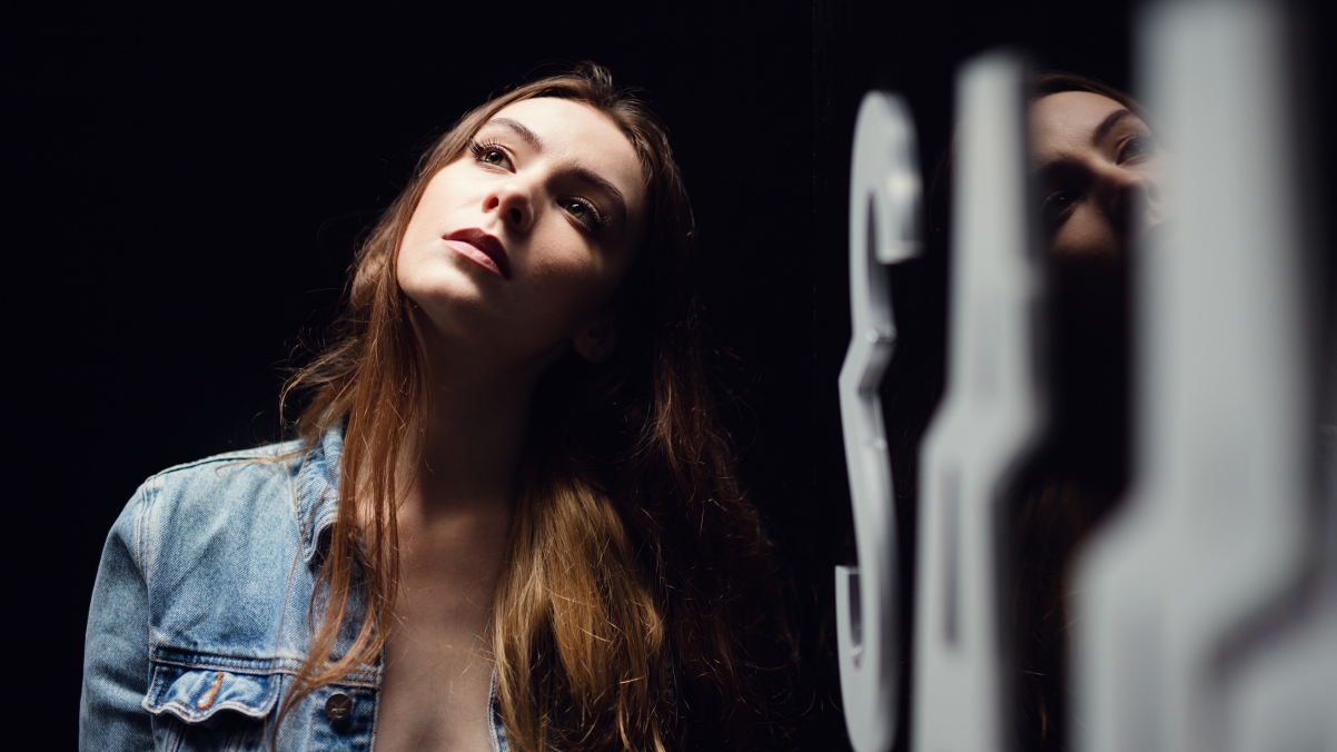 Sexy long-haired beauty in denim clothes 4K wall