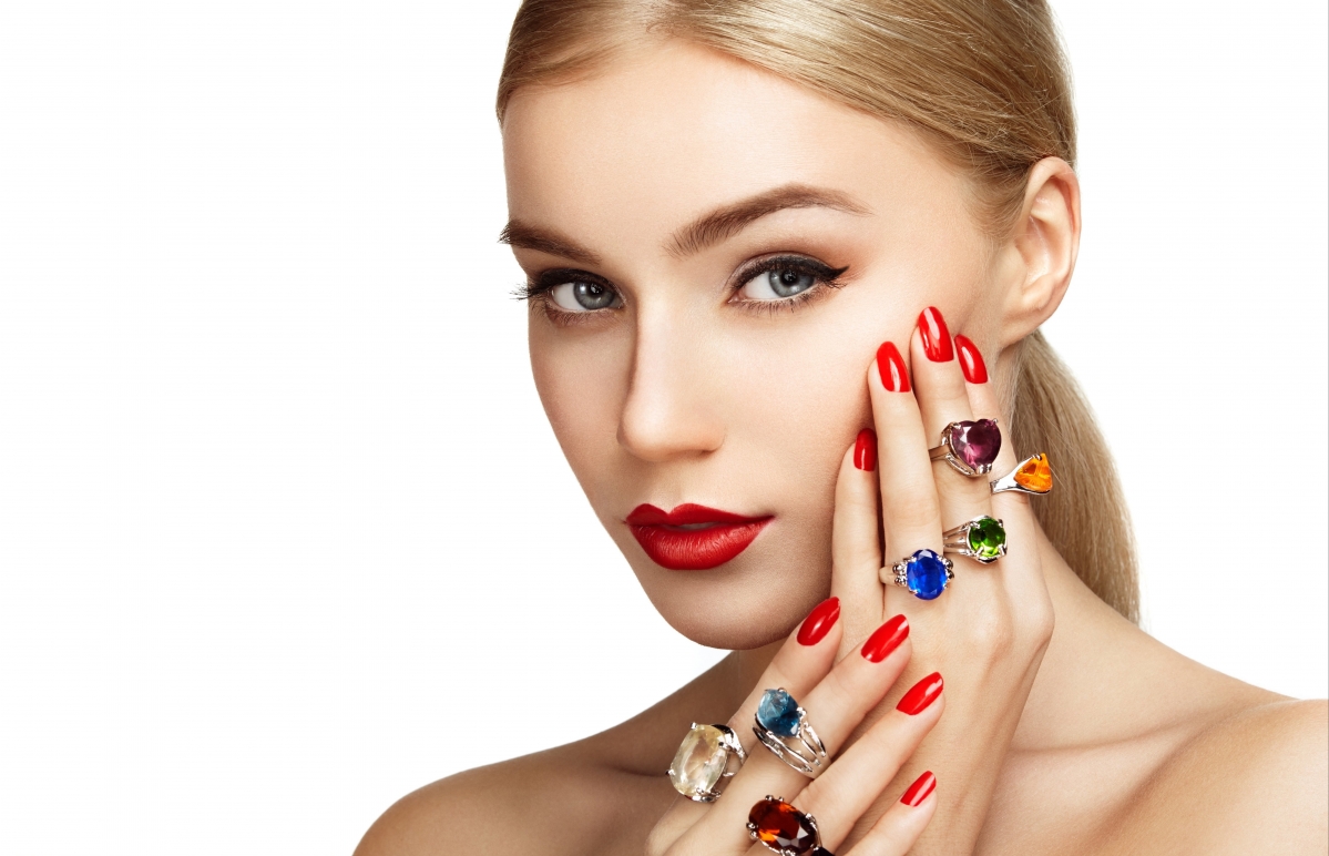 Beauty face makeup red lips manicure