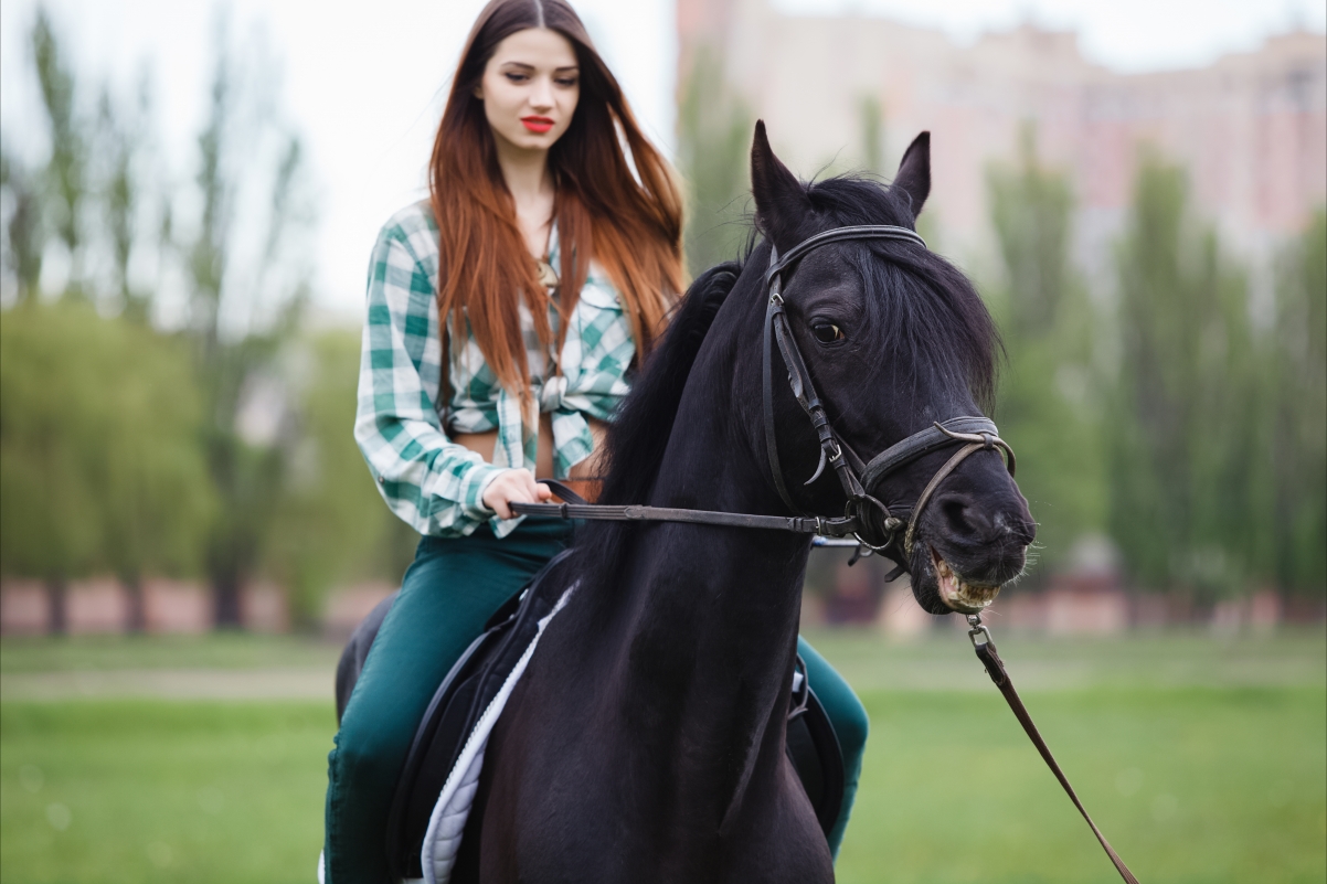 Beautiful girl riding a horse 5K wallpaper