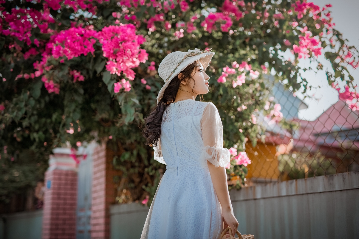 Beautiful elegant lady in white dress