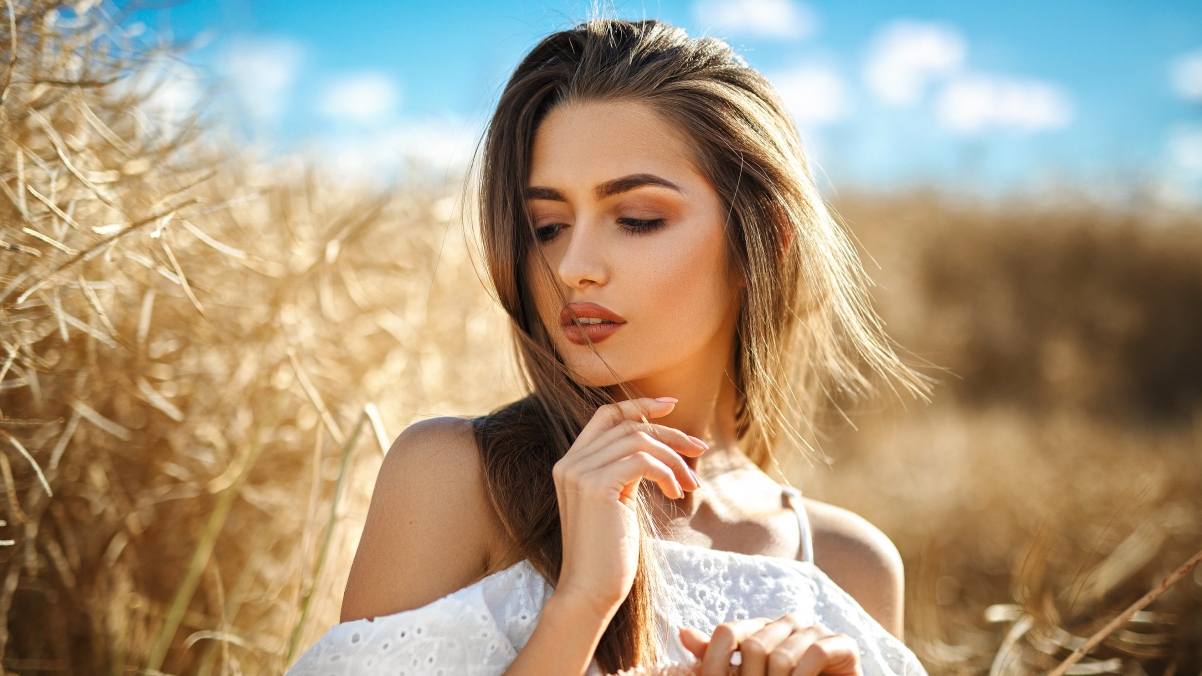 Beautiful blonde in wheat field