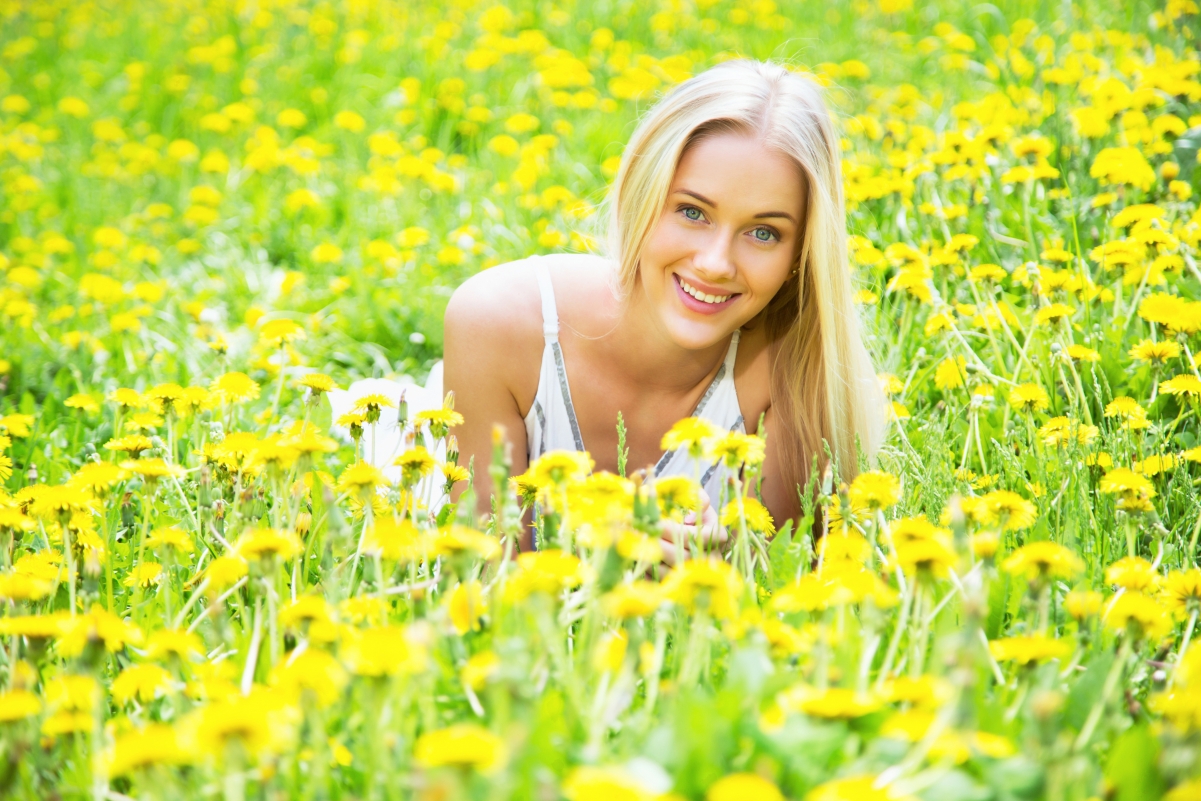 Beautiful blonde woman with flower dandelion grass 4