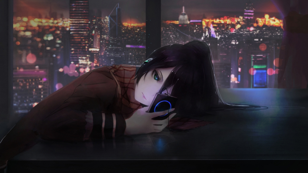 Girl lying on the table listening to music