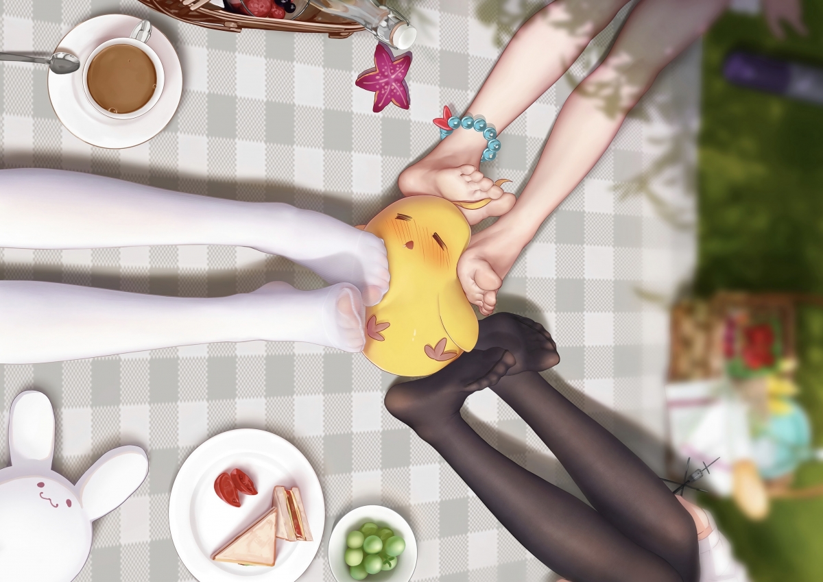 Three girls on white picnic outdoors