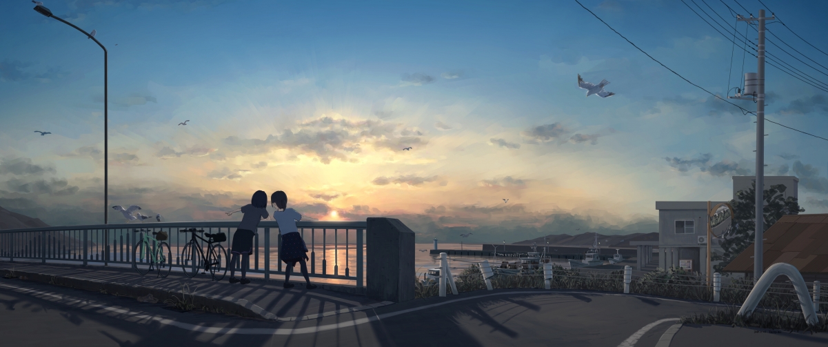 Two female students cycling bridge after school