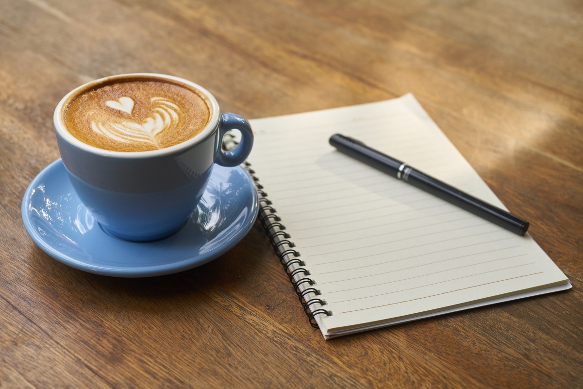 Coffee pen notebook work